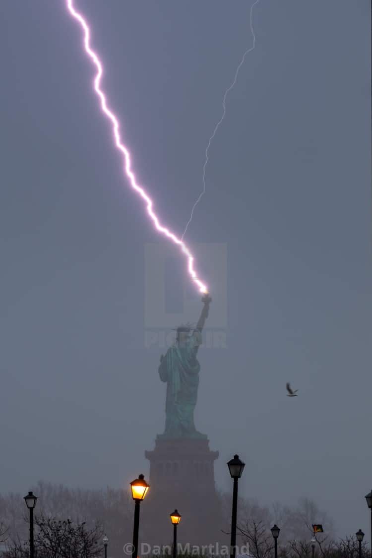 Statue of Liberty Being Struck by Lightning by Dan Martland